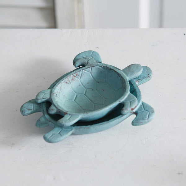 http://villagemerchant.com/cdn/shop/files/painted-cast-iron-sea-turtles-jewelry-trinket-tray-43371035459880_600x.jpg?v=1699795028