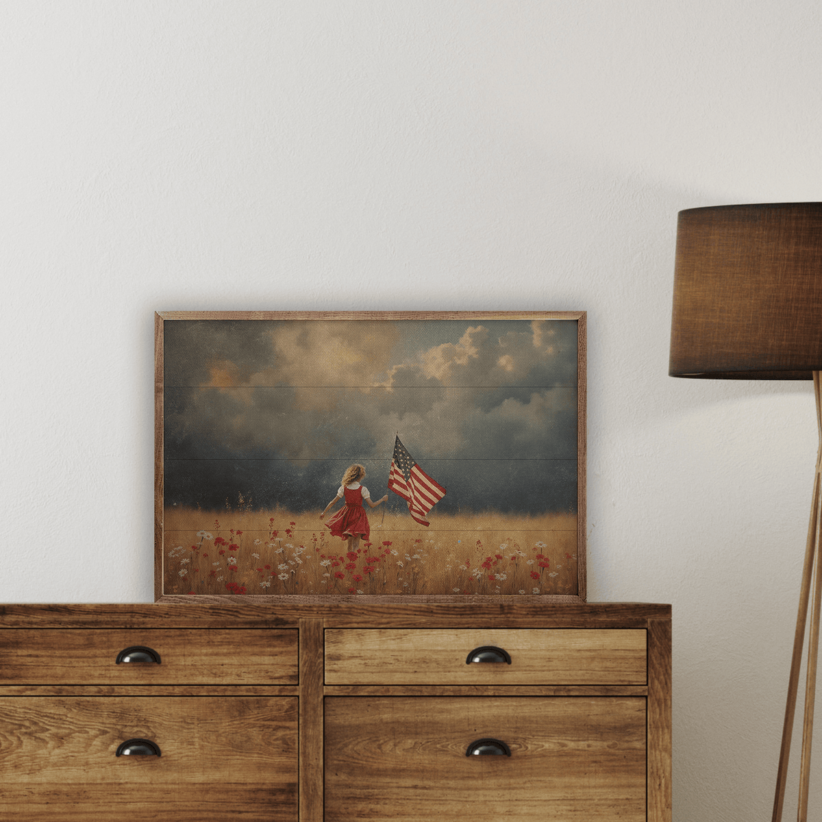 Kendrick Home Walnut Frames Girl Carrying Flag Through Storm Printed and Framed Wall Sign