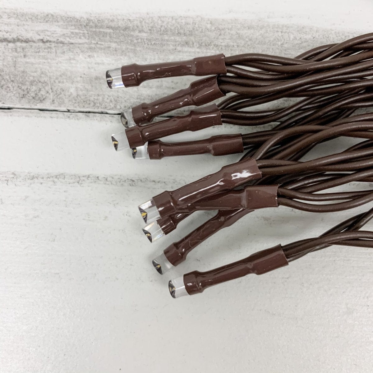 Light String - Electric Plug-In 100 Count Teeny Rice LED Clear Bulbs - Brown Cord-Wholesale Home Decor-The Village Merchant