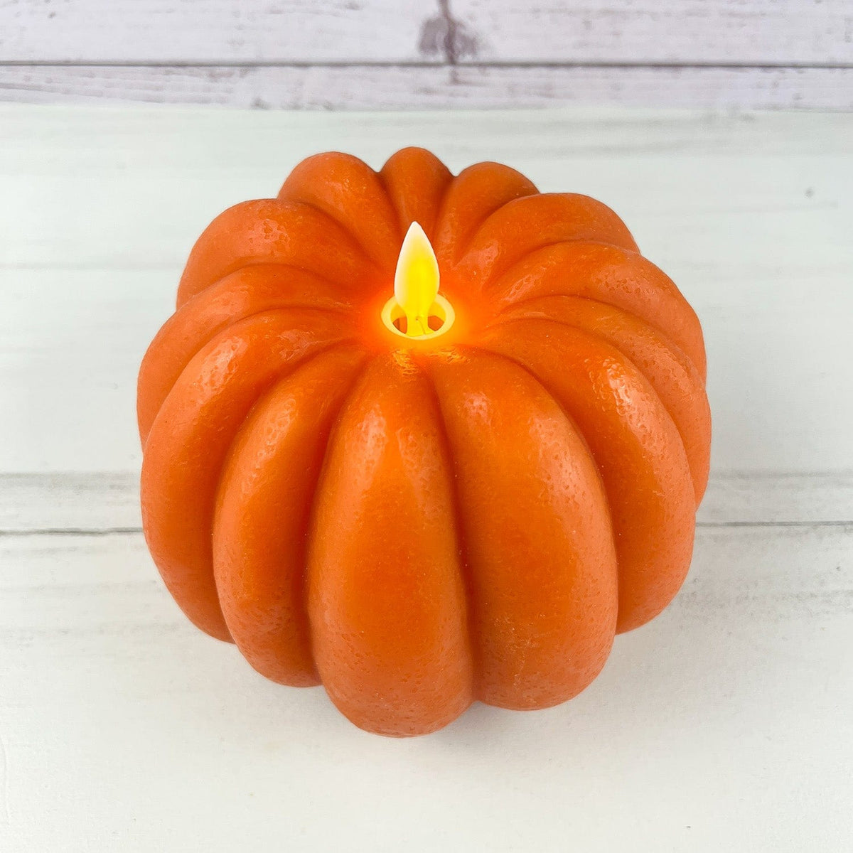 Orange Carved Pumpkin LED Battery Candle With Moving Flame 6&quot; Diameter