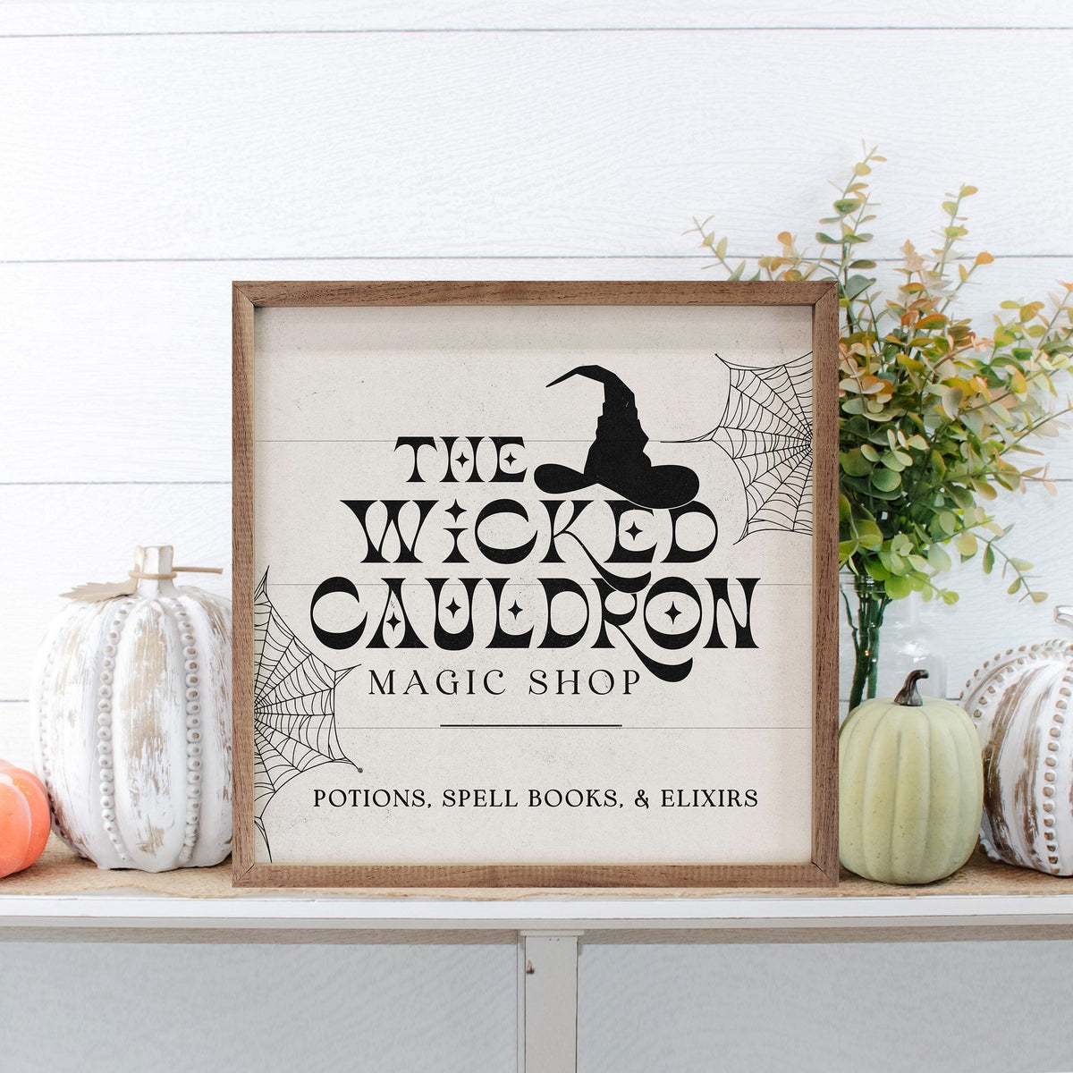 Kendrick Home Walnut Frames Wicked Cauldron Hat And Webs White Printed and Framed Wall Sign